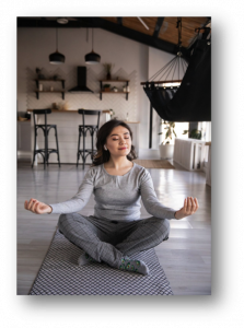 A woman practising mindfulness and meditation